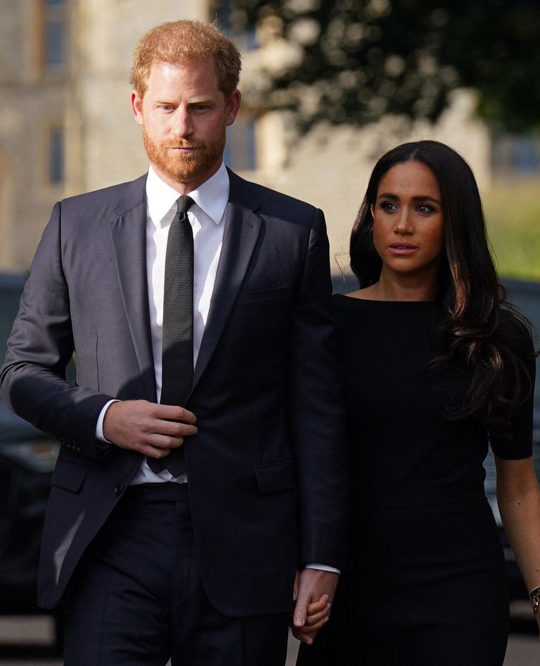 Britain's Prince Harry and Meghan, Duchess of Sussex on the long Walk at Windsor Castle on September 10, 2022
