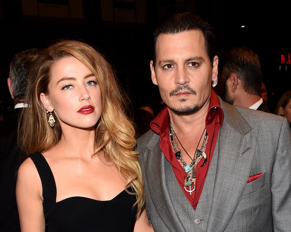 Amber Heard y Johnny Depp asisten al estreno de "Black Mass" durante el Festival Internacional de Cine de Toronto 2015. | Foto: Getty Images