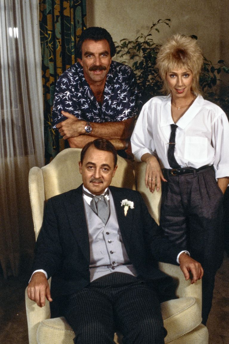 Tom Selleck (as Magnum), Jillie Mack (as Sally Ponting), and John Hillerman (as Higgins) in the MAGNUM PI episode, "Professor Jonathan Higgins," which aired January 10, 1985. 

