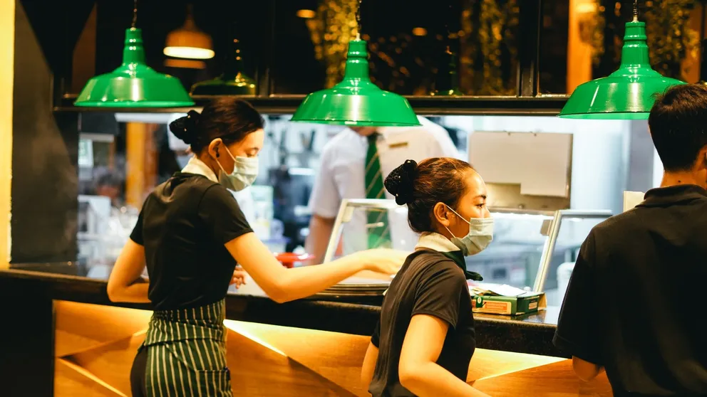 Sonya worked as a waitress in a restaurant.  |  Source: Unsplash