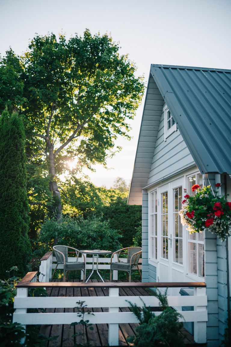 Una casa con muchos árboles en su patio trasero. | Foto: Unsplash