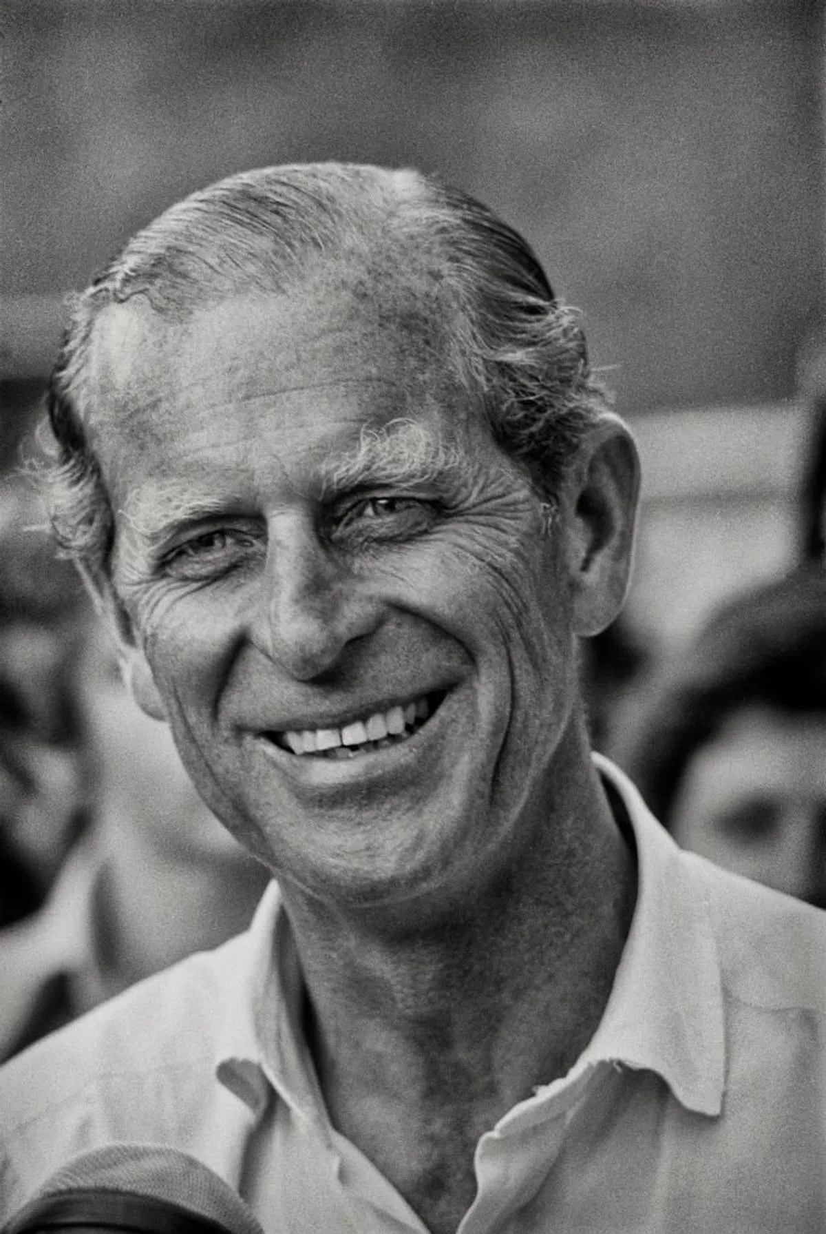 Prince Philip, Duke of Edinburgh smiles during a carriage driving event at Home Park, Windsor, England, July 1975 | Photo: Getty Images