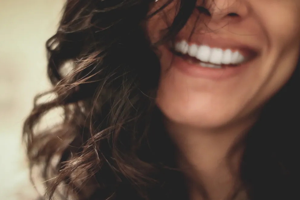 Una mujer sonriendo. | Foto: Unsplash
