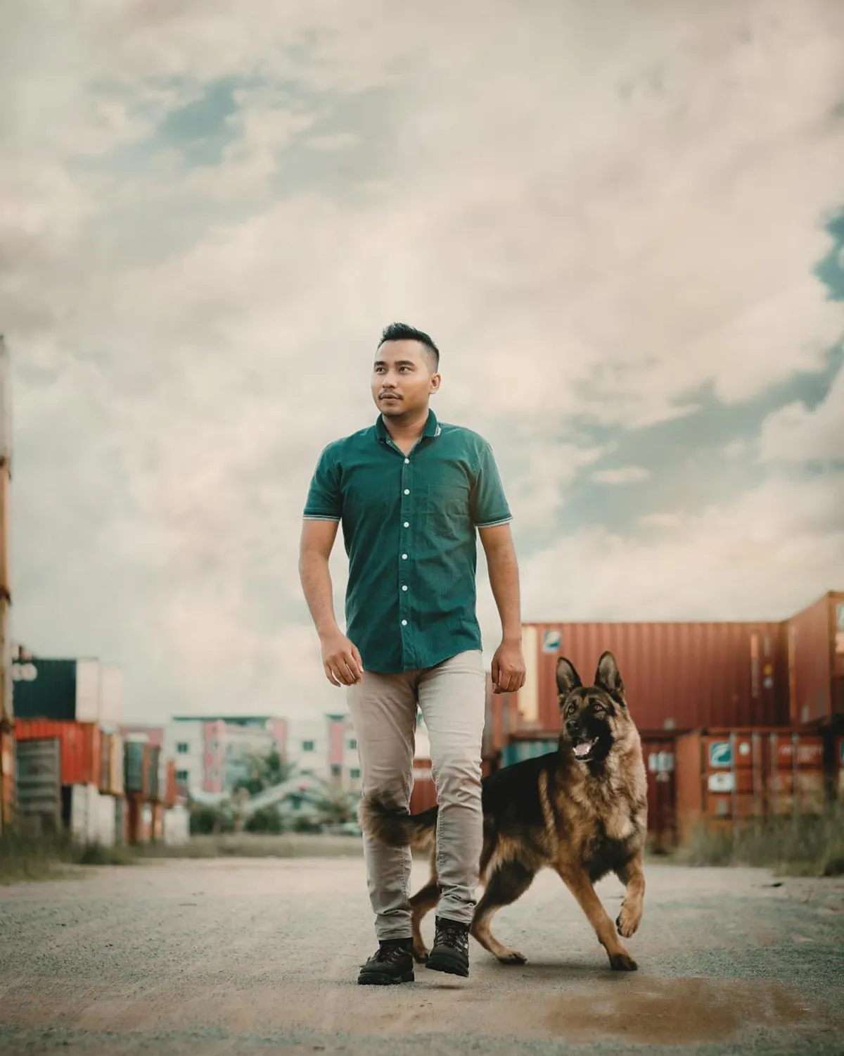 Man walking with his dog | Photo: Pexels