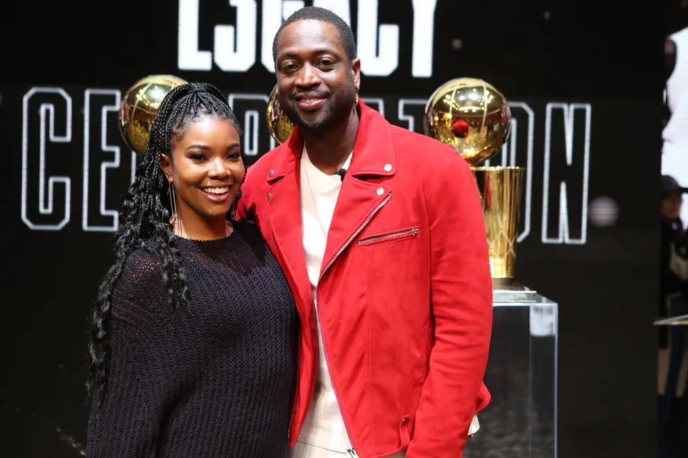 Dwyane Wade with his wife Gabrielle Union at the Jersey Retirement Flashback Event in Miami on February 21, 2020. | Photo : Getty Images