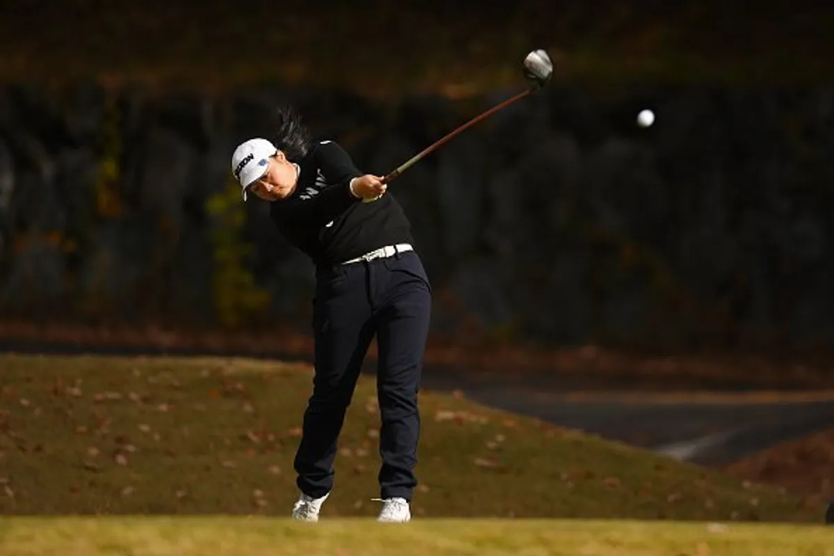 A golfer pictured hitting her tee shot on the 8th hole during the final round of the Japanese LPGA Final Qualifying Tournament | Photo: Getty Images