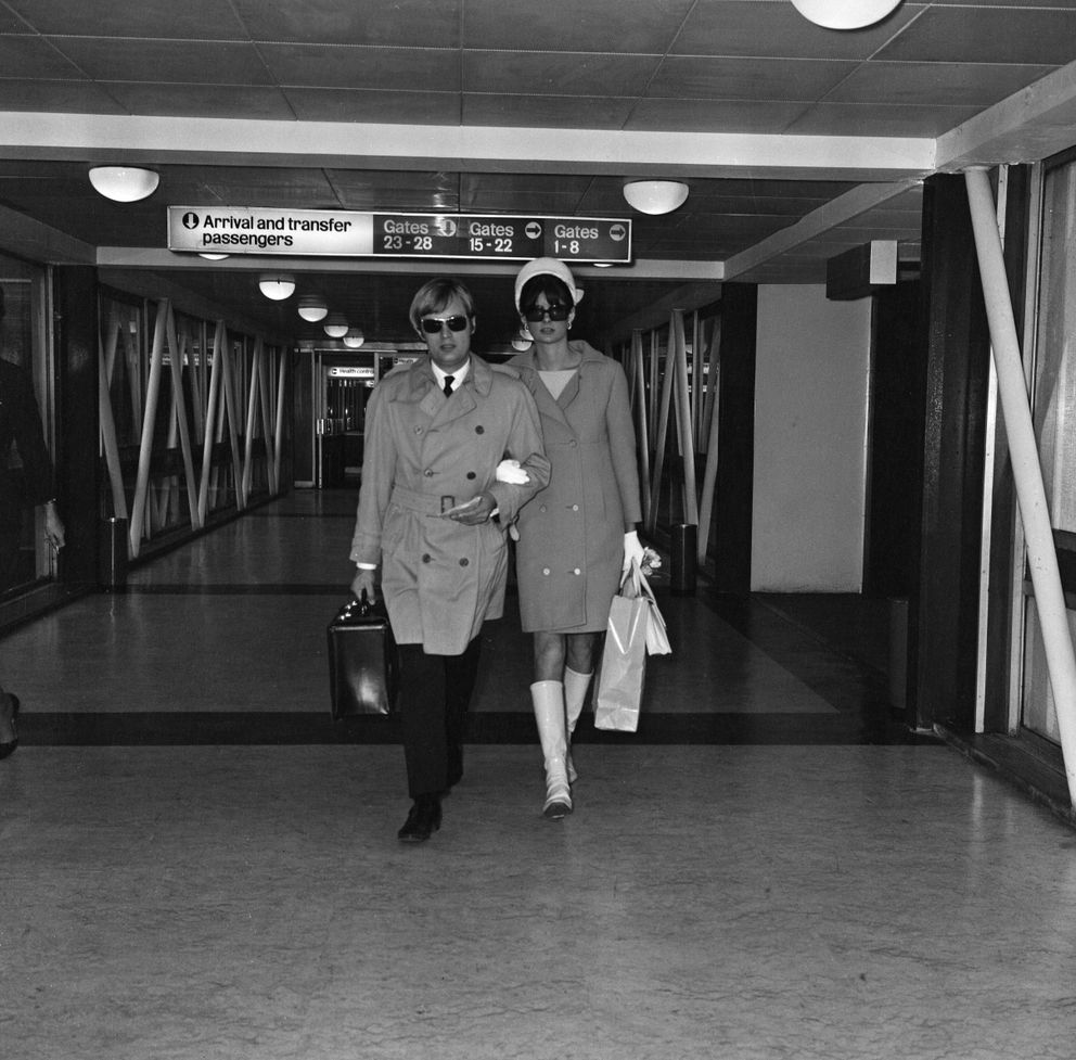 David McCallum and Katherine Carpenter leaving Heathrow airport in 1968.
