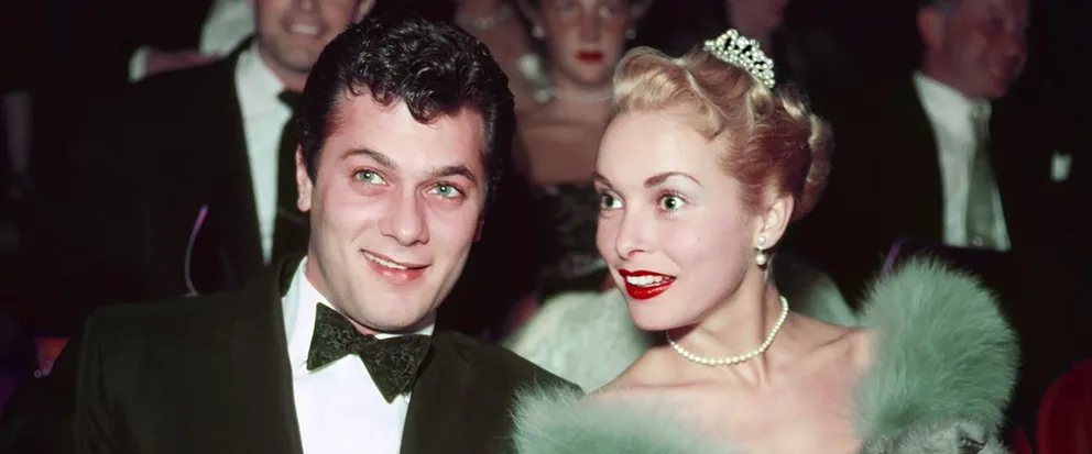 Tony Curtis and Janet Leigh at an official event around 1955 |  Source: Getty Images