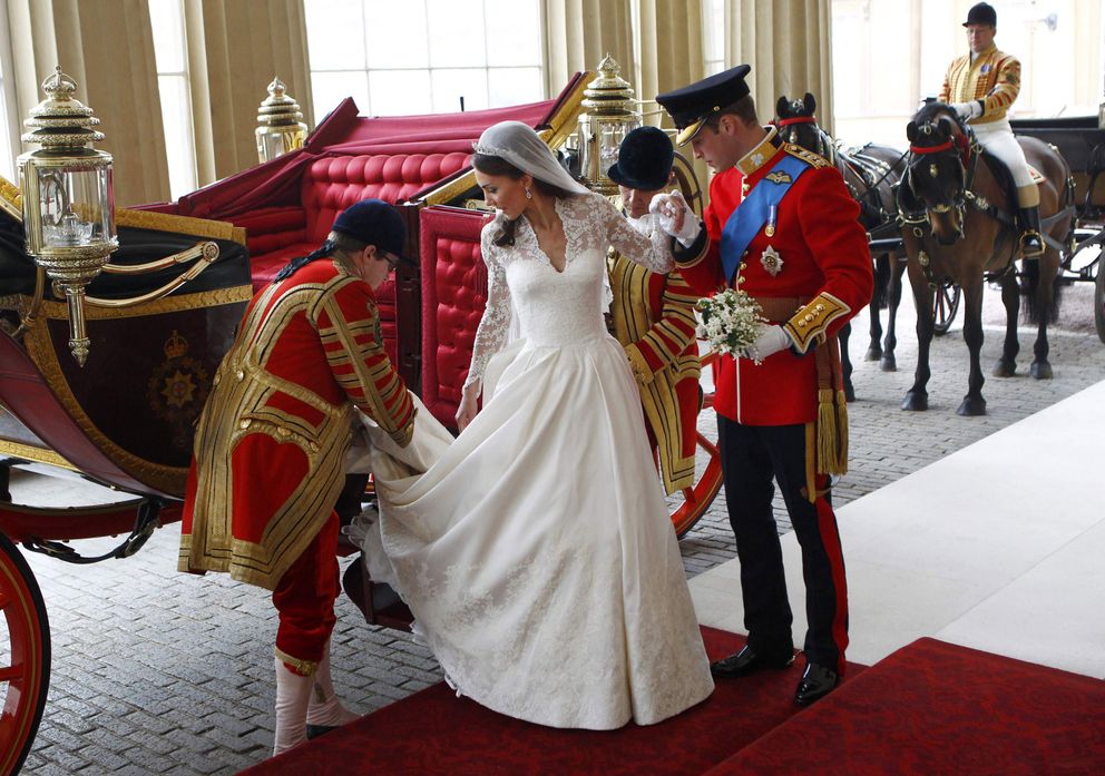 The newlyweds Kate Middleton and Prince William coached at Buckingham Palace after their royal wedding at Westminster Abbey on April 29, 2011 in London, England.  |  Source: Getty Images  