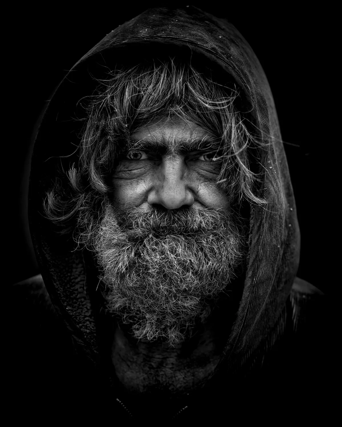 An older man looking into the camera. | Pexels/ Pixabay
